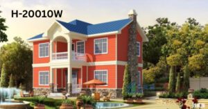 A red house with a blue roof and a fountain in the front yard.