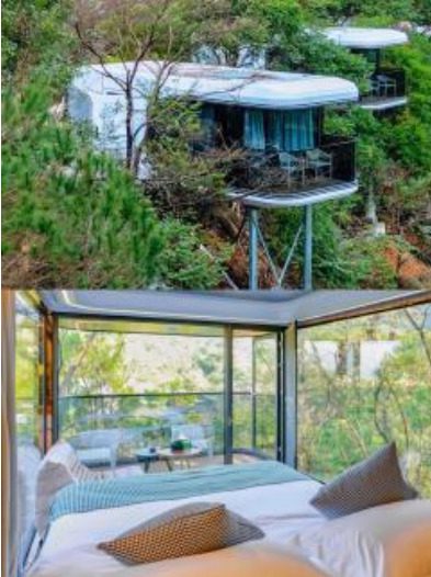 A tree house with a bed and two chairs